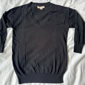 Black v-neck sweater. Very light wait.